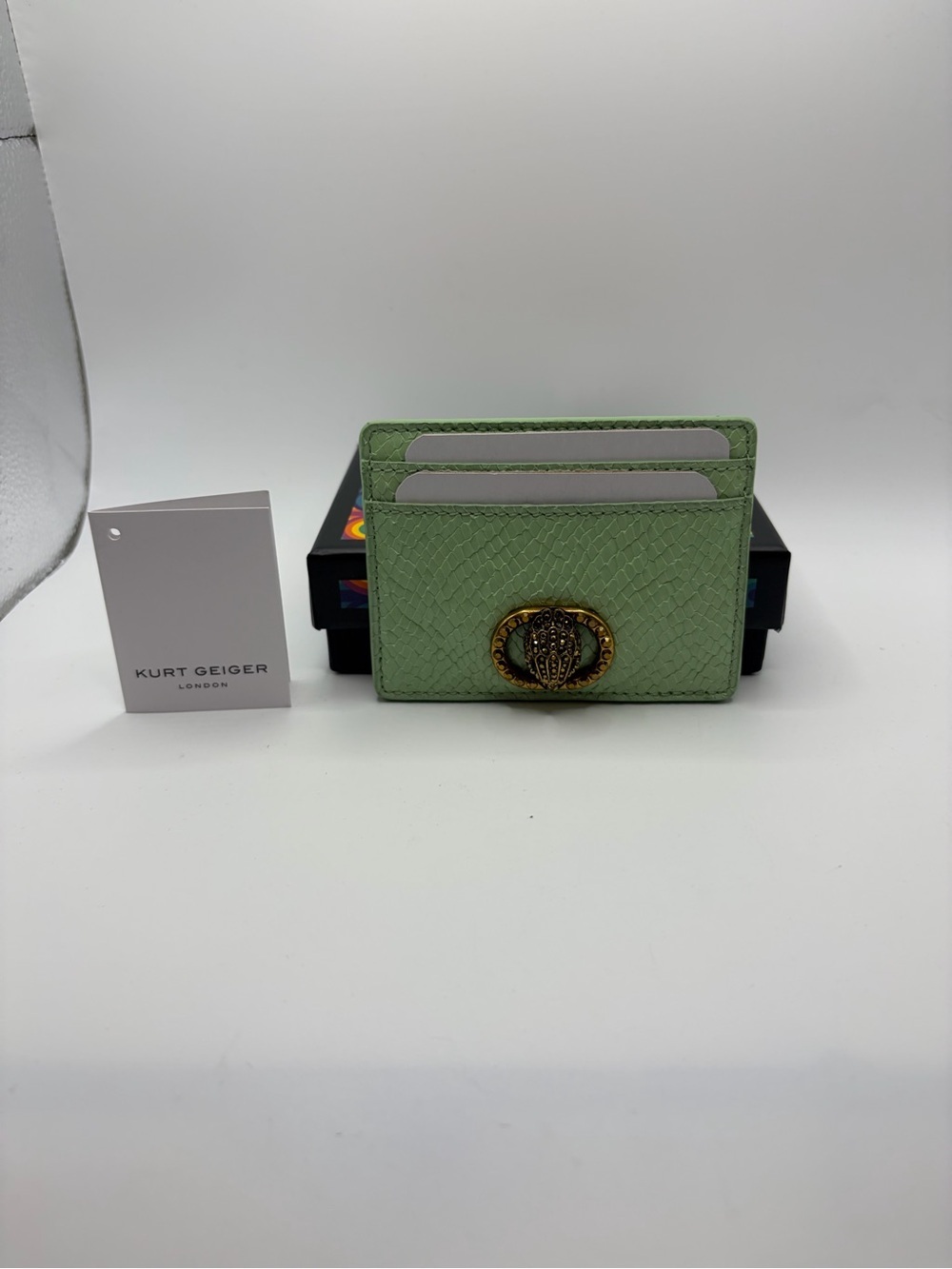 Kurt Geiger Mint Green Textured Leather Card Holder with Gold Bee Motif